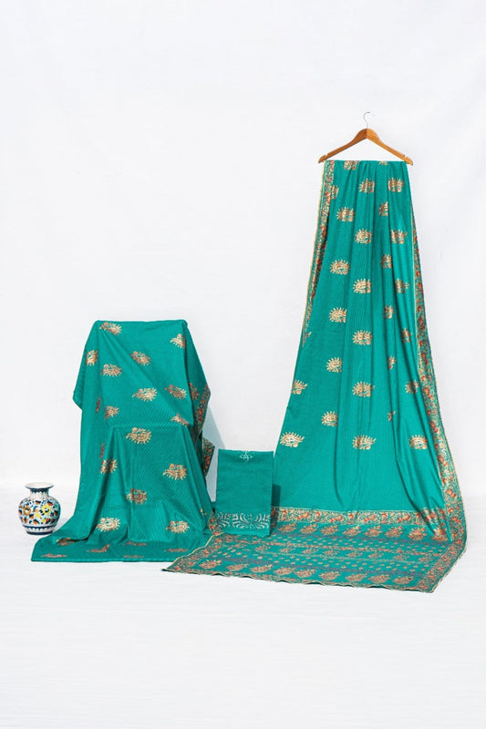 Teal green Zariyat by Sumera lawn saree featuring golden hand block prints, part of the Heritage Lawn Series