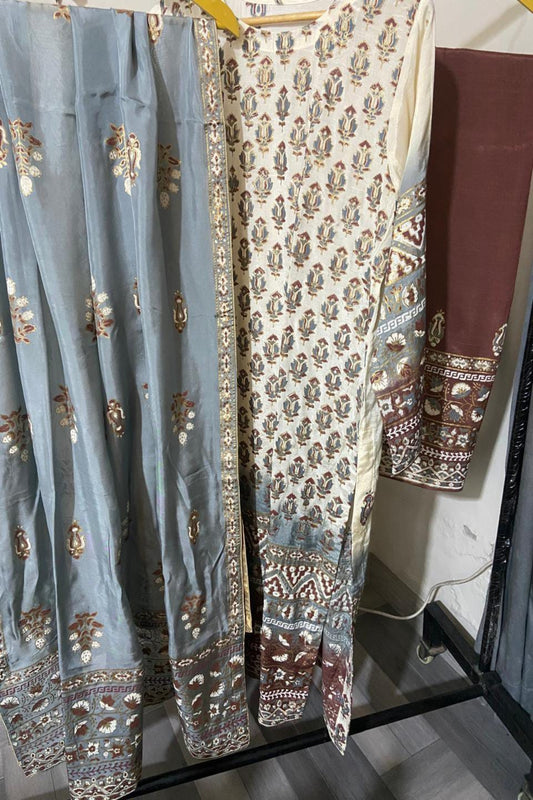 3-piece unstitched hand block print suit in fine raw silk with matching medium silk dupatta, ideal for festive, wedding, and formal wear.