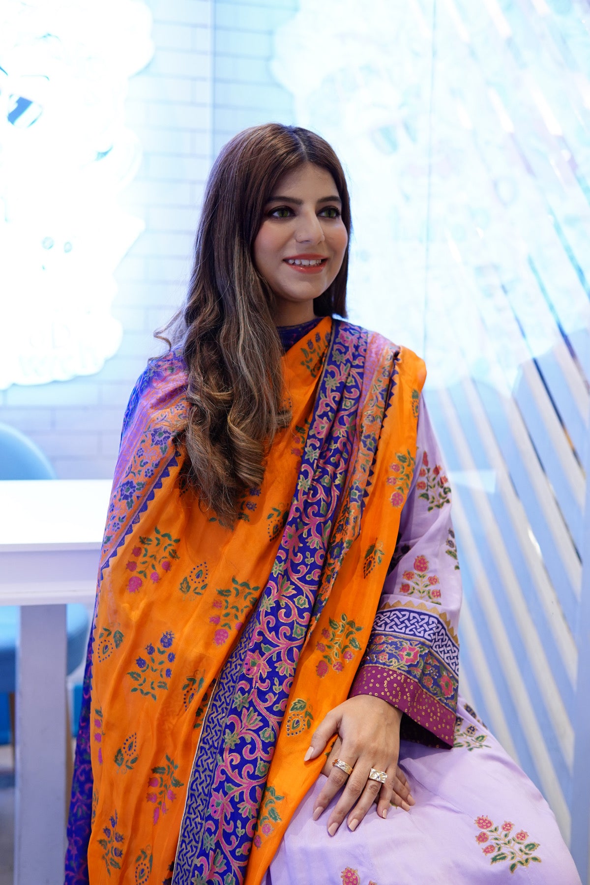 Close up details of Zariyat by Sumera lilac Kalidar frock sleeves with intricate block print design and multi-color border."