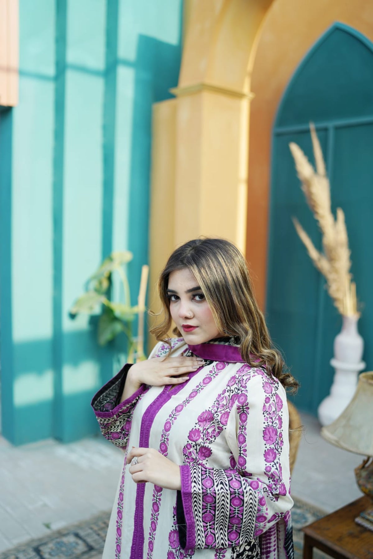 Close-up view of intricate sleeve details on a block print suit.