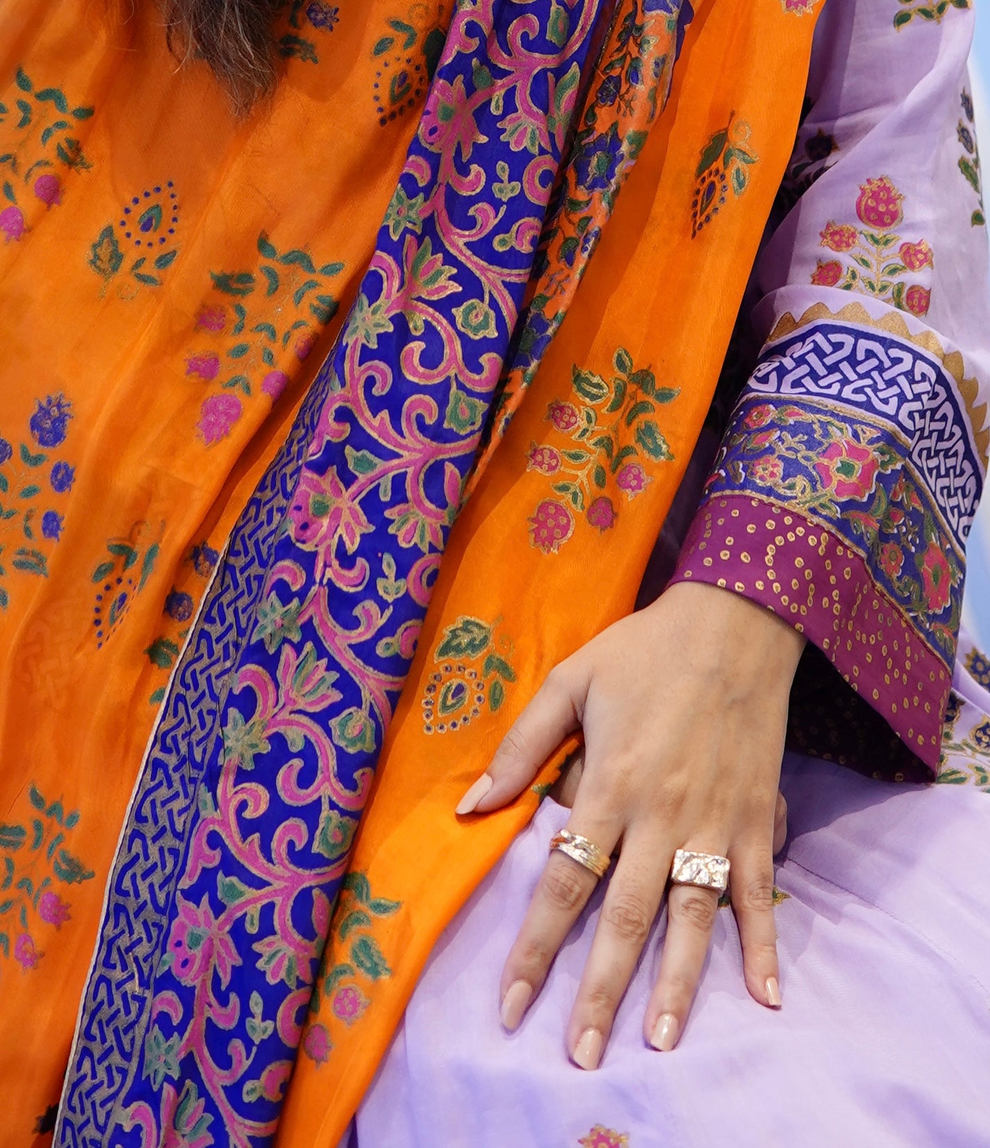Close up details of Zariyat by Sumera lilac Kalidar frock sleeves with intricate block print design and multi-color border."