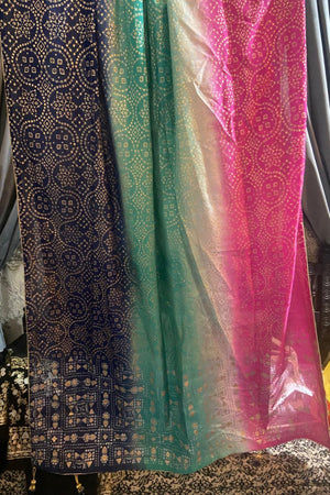 Full display of the royal blue kalidar frock paired with a vibrant pink, green, and blue shaded dupatta and optional crush lehenga.