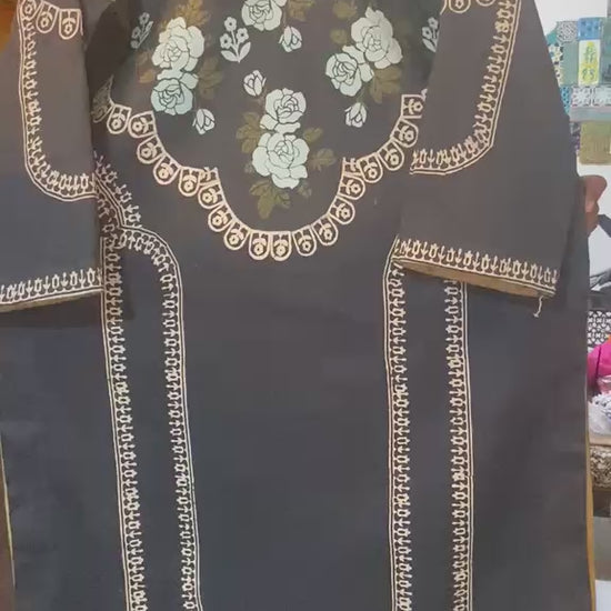 Flat lay view of black lawn kurti showcasing traditional hand block-printed floral patterns