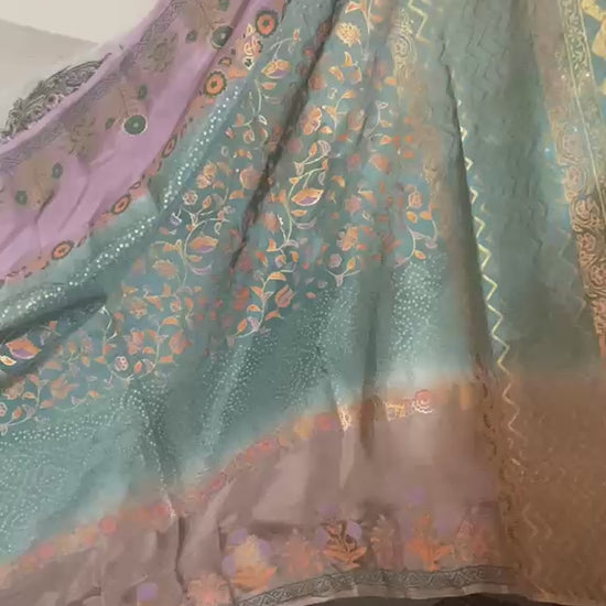 Draped view of shaded silk dupatta showing traditional block printing and four-sided golden massuri trim