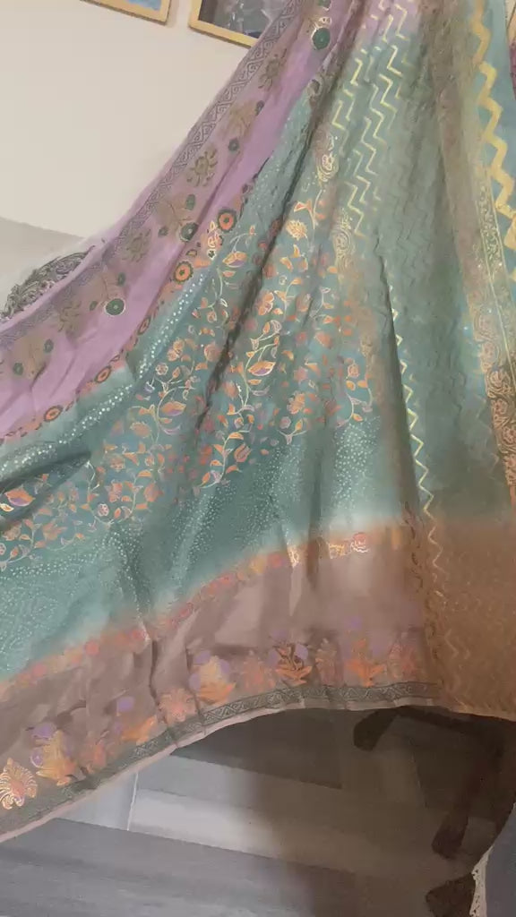 Draped view of shaded silk dupatta showing traditional block printing and four-sided golden massuri trim