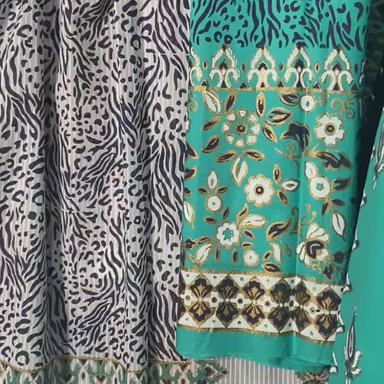 Get a closer look at the fabric texture, print details, and styling of this elegant turquoise and white unstitched 3-piece ensemble.