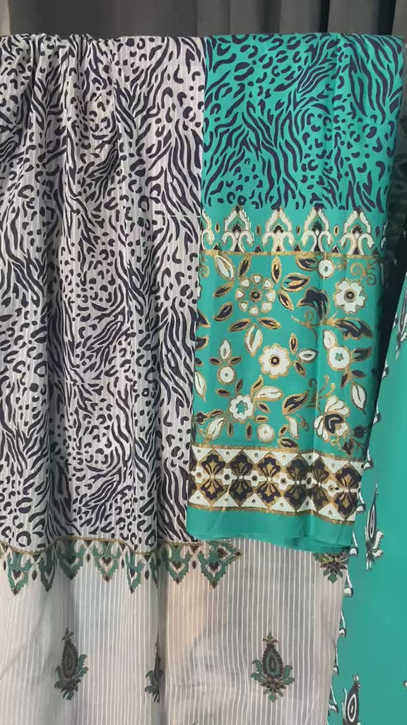 Get a closer look at the fabric texture, print details, and styling of this elegant turquoise and white unstitched 3-piece ensemble.