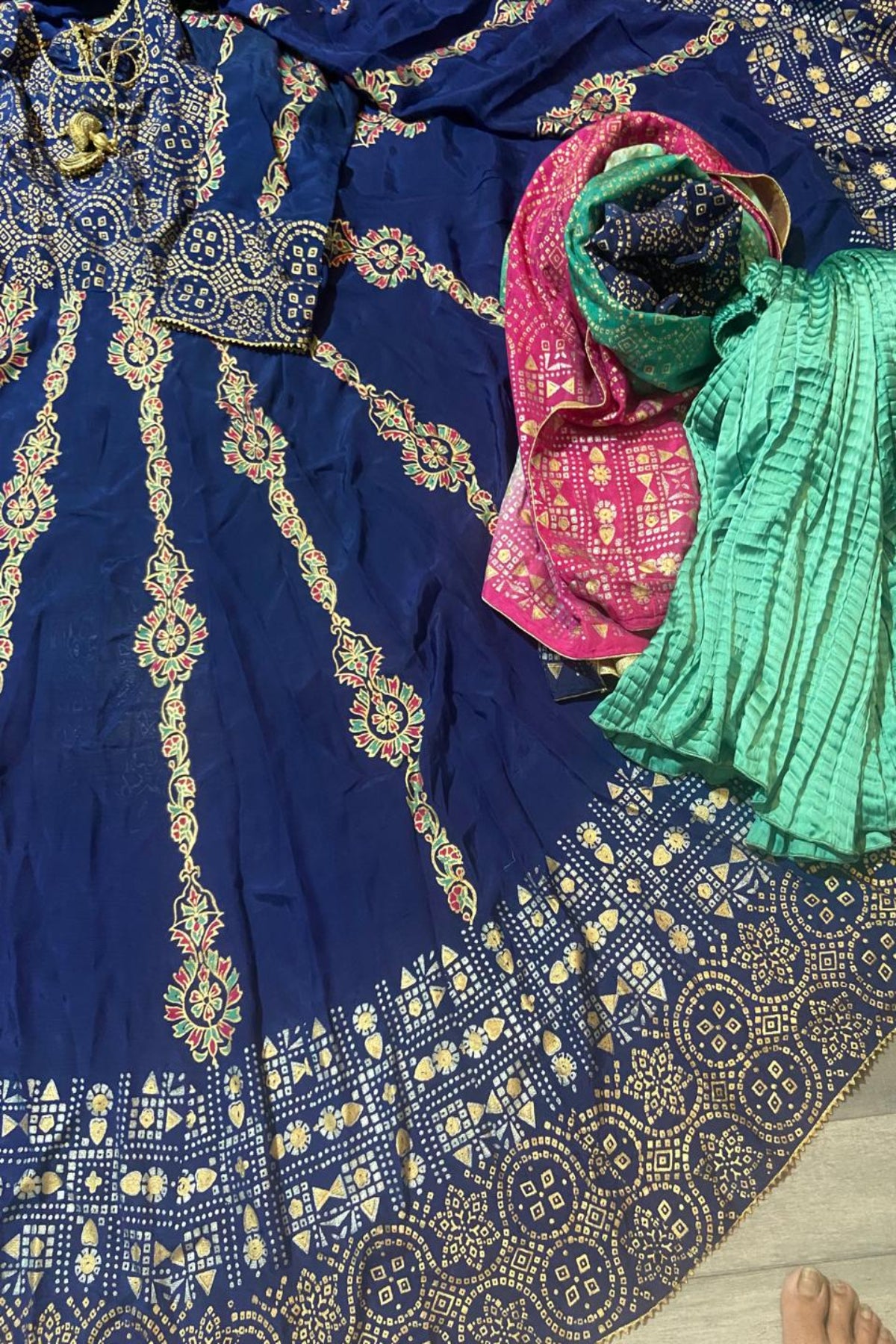 Premium royal blue raw silk stitched 2-piece block print kalidar frock and multi-shaded dupatta set with golden zari borders.