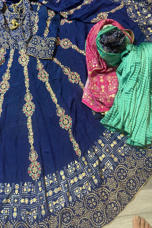 Premium royal blue raw silk stitched 2-piece block print kalidar frock and multi-shaded dupatta set with golden zari borders.