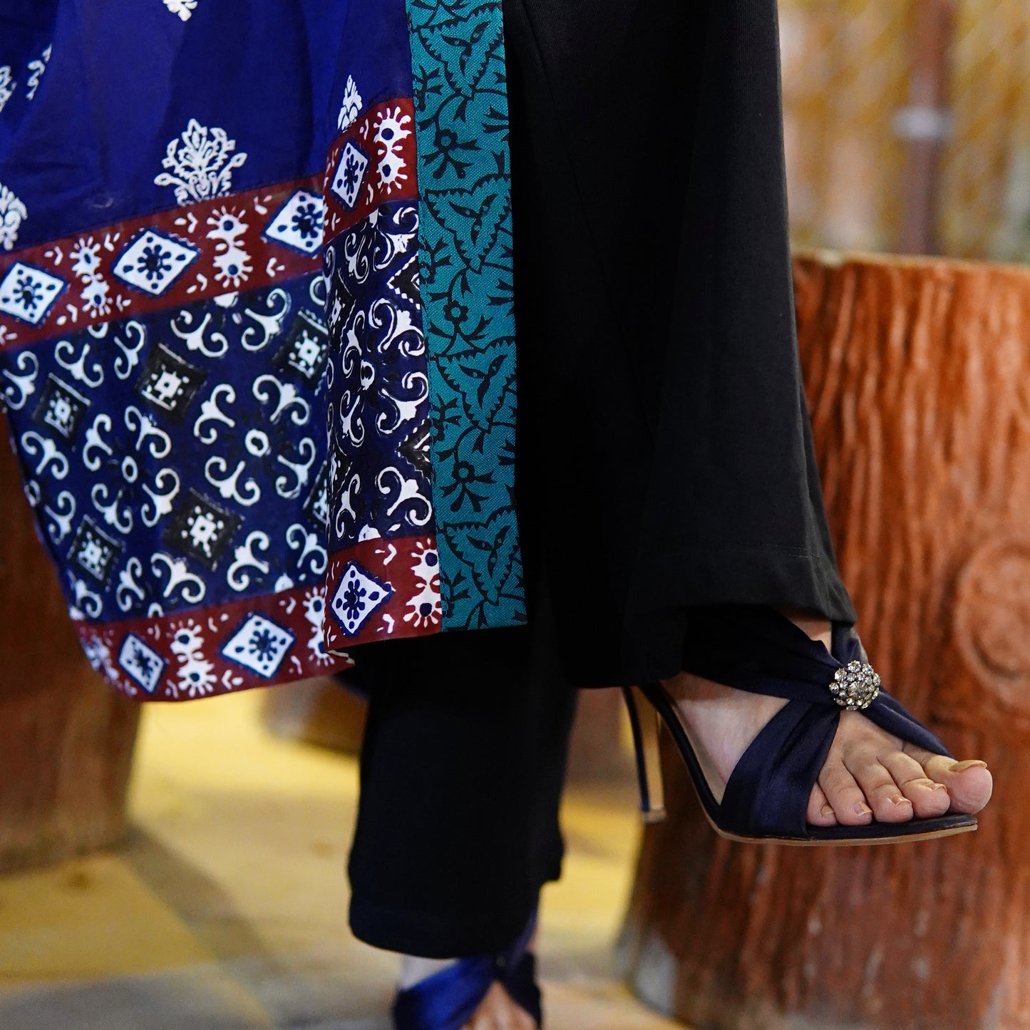 Detailed view of block printed and green border on royal blue silk gown by Zariyat by Sumera