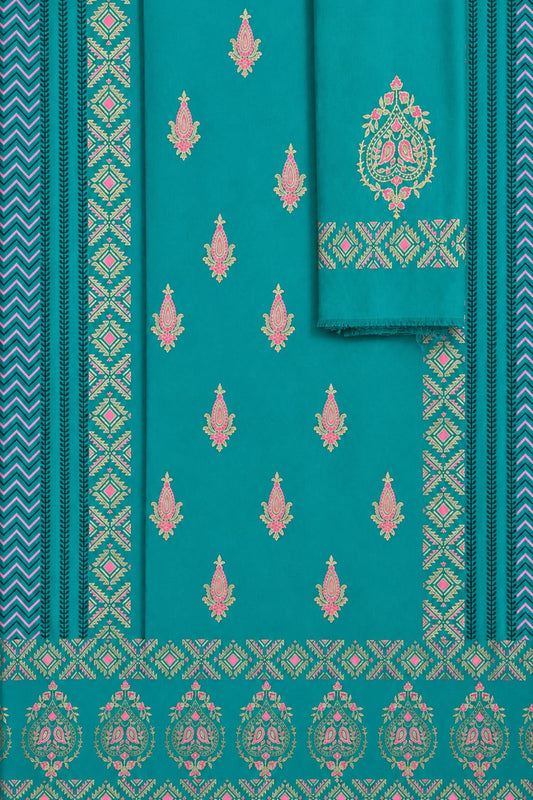 Flat lay of a teal colored lawn fabric suit with pink and gold traditional embroidery patterns by Zariyat by Sumera