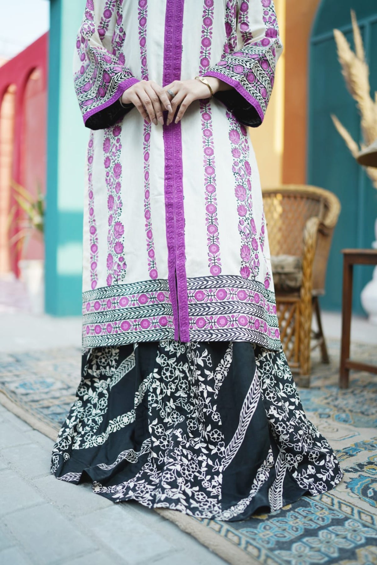 Traditional block print ensemble featuring intricate ethnic patterns.