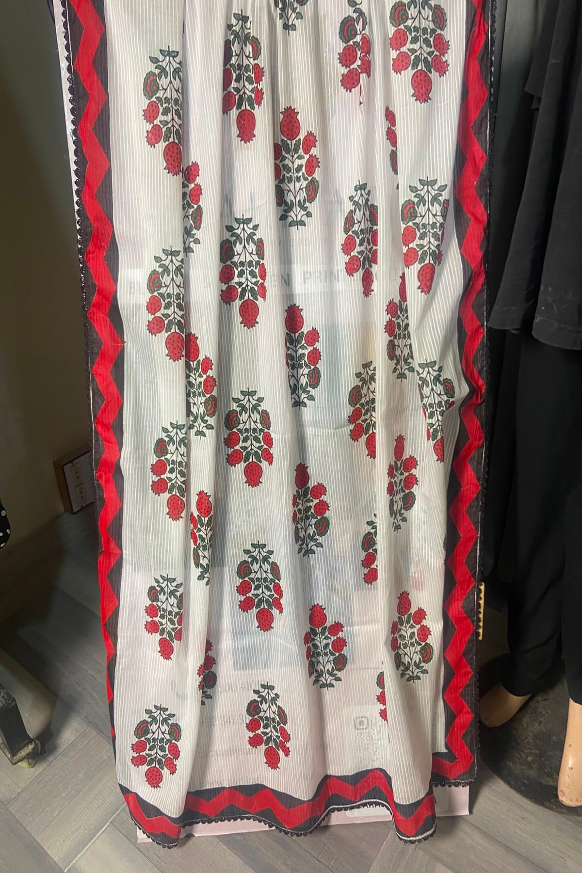 White and red dooria lawn block print dupatta featuring traditional floral motifs and lace edging