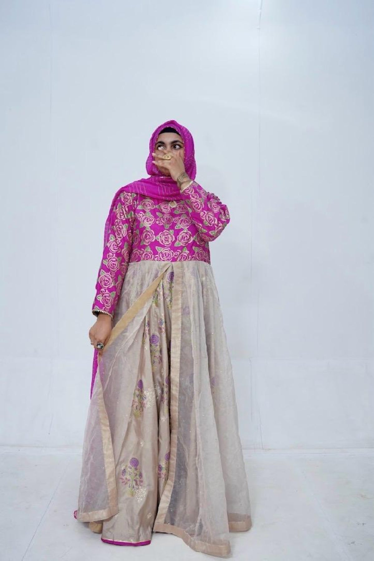 Full-length view of handcrafted 3-piece stitched block print long dress in raw silk with chiffon dupatta and golden Massuri trouser by Zariyat by Sumera