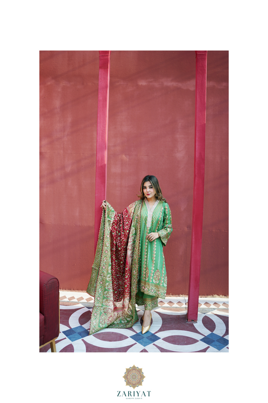 Close-up of Zariyat 3-piece stitched suit featuring premium green block print shirt and heavy multi-color patterned dupatta